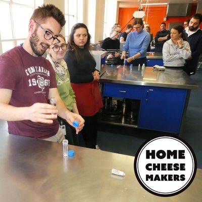 university students having fun while learning cheesemaking