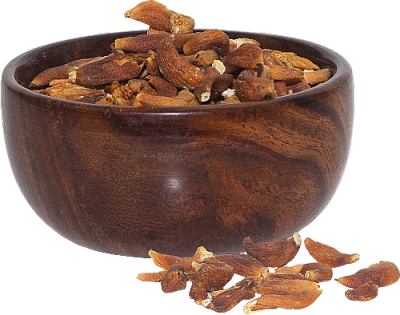 Wooden bowl filled with dried cloves, some spilled outside.