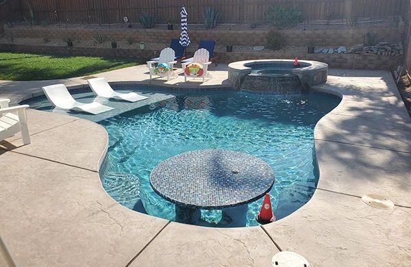 Custom Swimming Pool Designs for Your Backyard Oasis