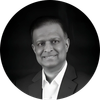 Black and white portrait of a man in formal attire.