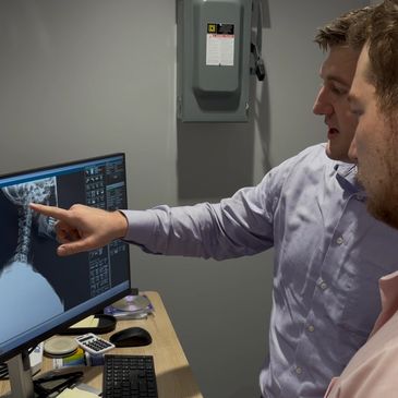 Dr. Plank Providing Education of Patients X-Rays