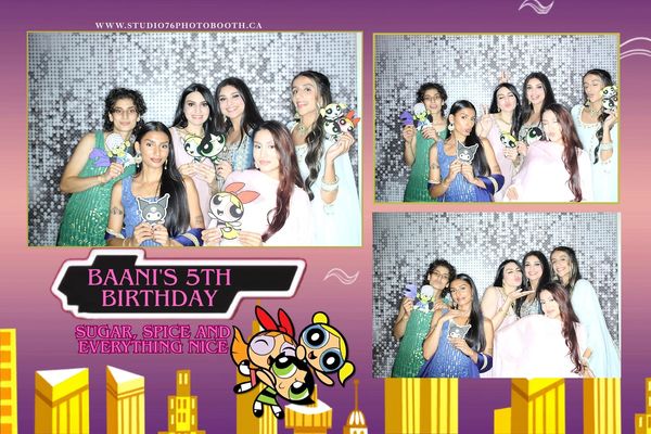 Family posing at Baani's 5th birthday party with Photo Booth rental in Vancouver & instant print.