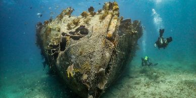 Shipwreck in Key Largo called Benwood and scuba divers. 