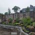 Concrete retaining wall with stone facade