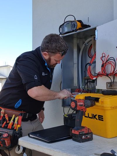 Sunshine Coast Electrician from JAX Power Solutions completing safe electrical switchboard work