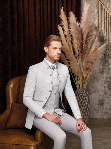 White silk woven 3 pice white tuxedo, made from the finest Italian Fabrics.