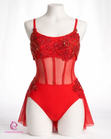 Red embellished lingerie with sheer panels on a mannequin.