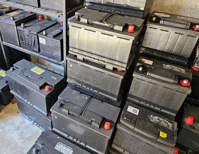 Picture of a bunch of batteries stacked 