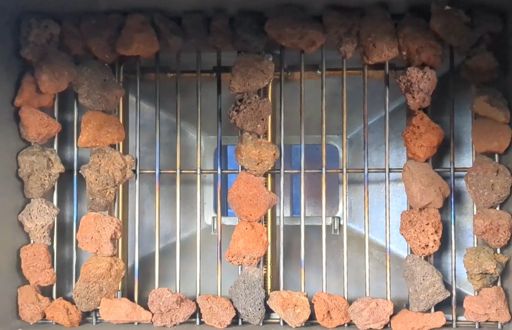 How Do I Put Lava Rock In My Grill?