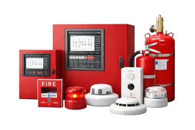 A collection of fire safety devices including alarms, extinguishers, and control panels.