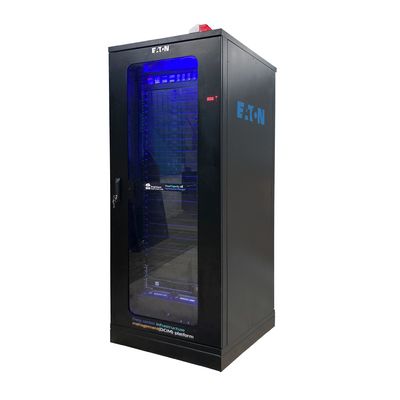 A black Eaton server rack cabinet with a glass door and blue lighting inside.