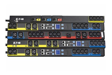 Eaton power distribution units with color-coded outlets and LCD displays.