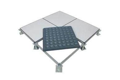 Raised access floor panels with a vibration dampening pad on a metal frame.