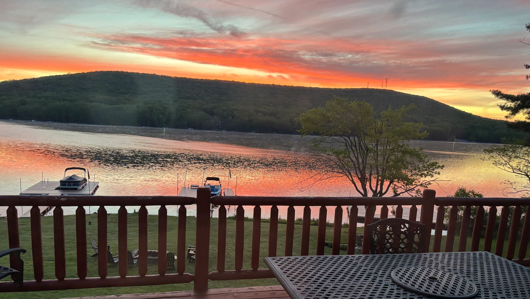 Sunset over a peaceful Deep Cree Lake from Raccoon Lagoon Deep Creek Lakefront Rental