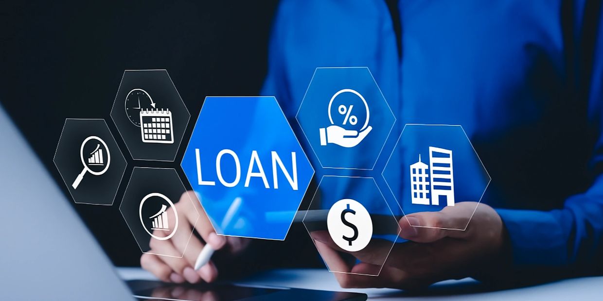 Hero Image (LOAN hexagons + businessperson on laptop)

ALT:
Business funding concept with loan icons