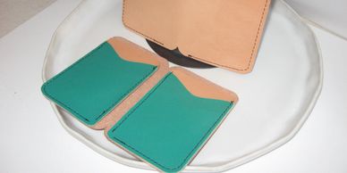 Men's green Leather Wallet made with 4 card slots and 2 slots for bills. Made in Raleigh, NC.