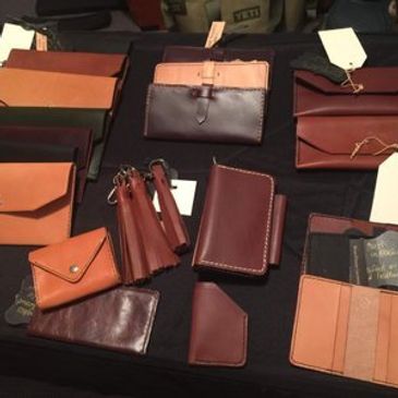 Leather wallets, leather tassels and leather ladies clutches, leather tote.