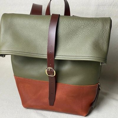 green and brown leather backpack, roll top leather rucksack made in Raleigh, NC.
whitdaniel.com