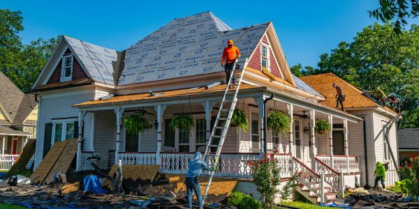 Construction team completing a home renovation project with quality craftsmanship.