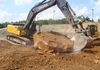 Removing Large Rock From Excavation Area