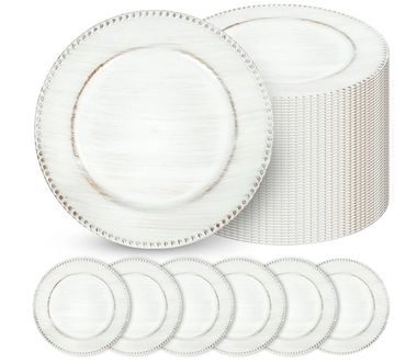 Set of elegant white round plates with beaded edges.