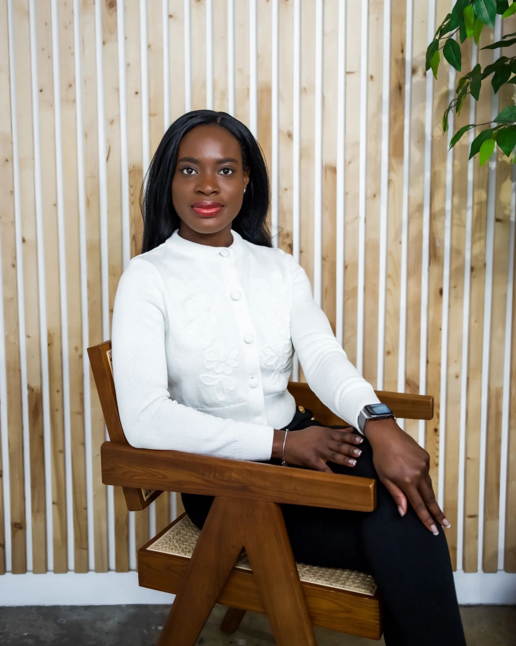 Andréanne, founder of Fund'A, seated and smiling at the camera
