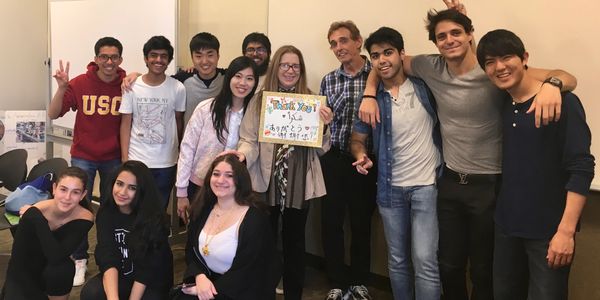 a group of students with their teacher 