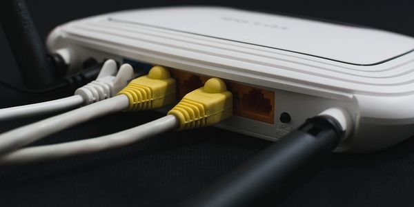Wireless Router with Cables coming out of the back 