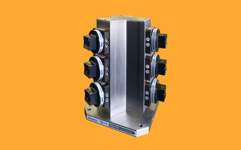 This 3 sided vise column has 9) Jergens Drop-&-Lock Pallets mounted on the column with QLS bushings