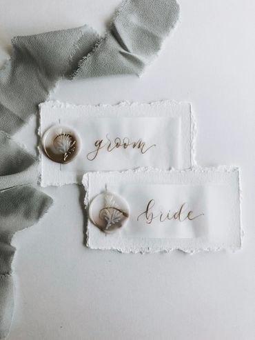 Groom and bride calligraphy place cards with wax seal stamp 