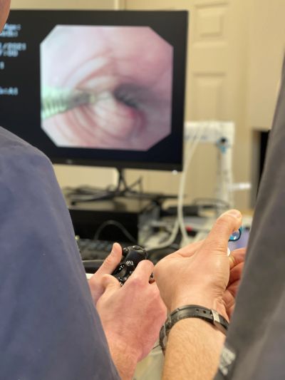 Medical professionals performing an endoscopy.