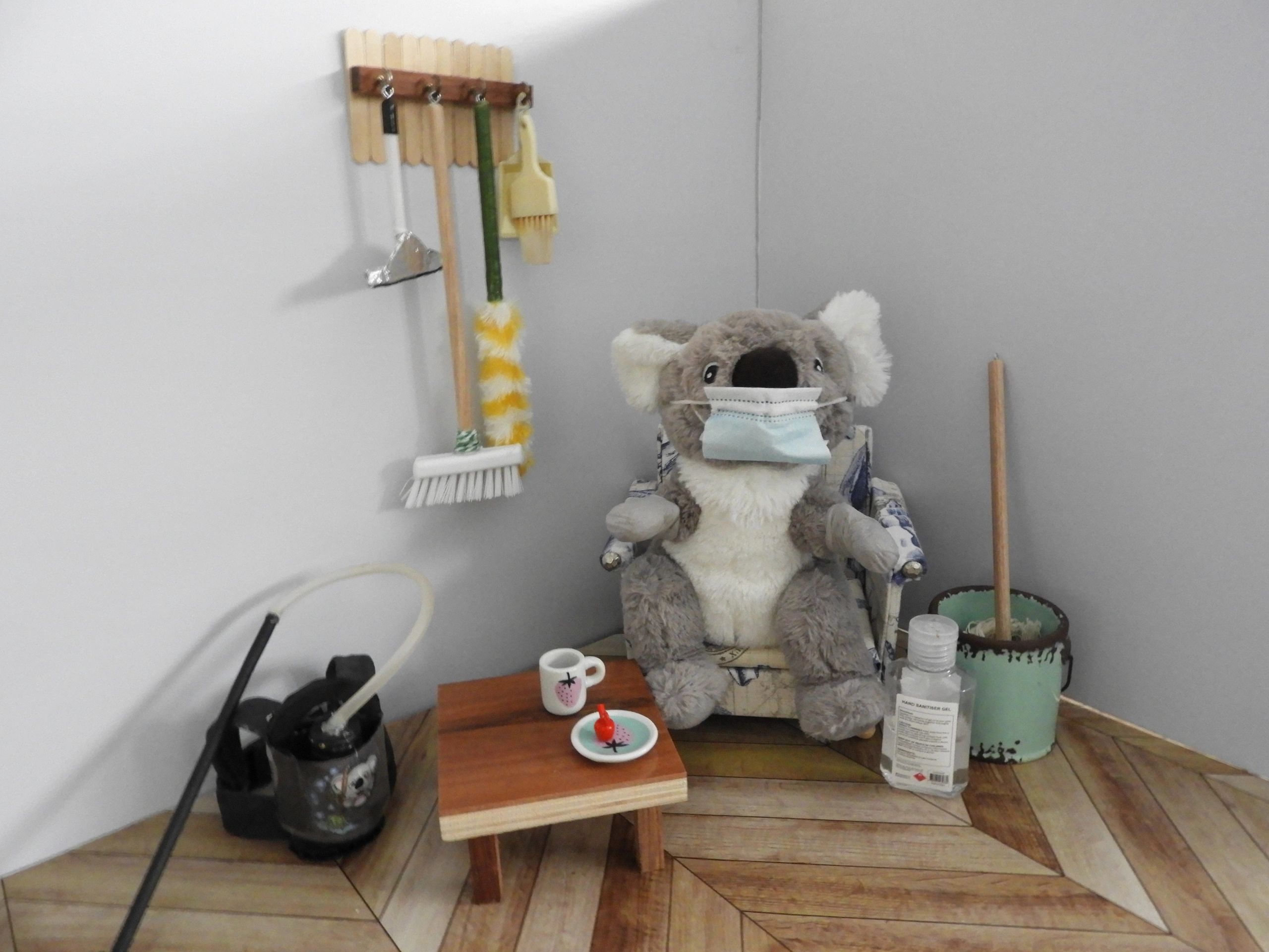 moto (koala) sitting with equipment waiting to start work