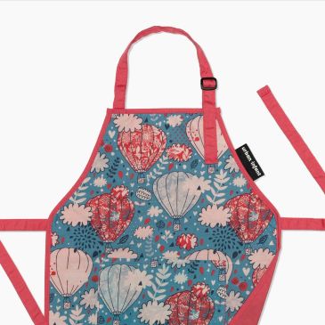 Colorful apron with hot air balloon design.