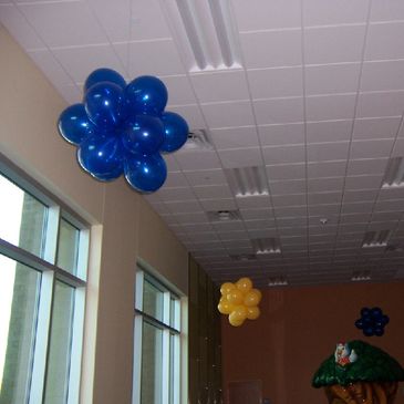 Blue & yellow ceiling topiaries