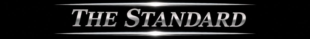 Logo of The Standard in silver on a black background.