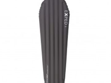 Black inflatable sleeping pad with ridges.
