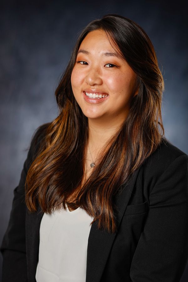 Woman posing for professional headshot 