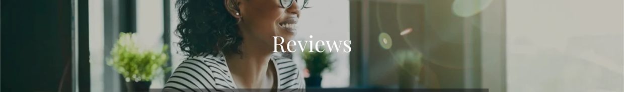 Woman smiling with 'Reviews' text overlay.