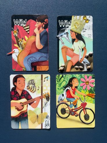 Four illustrated cards featuring people and animals.