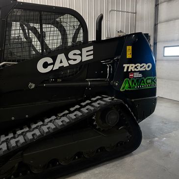 skid steer services with Case TR320 Black skid steer