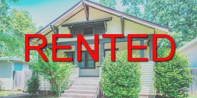 Small house with large red "RENTED" text overlay.