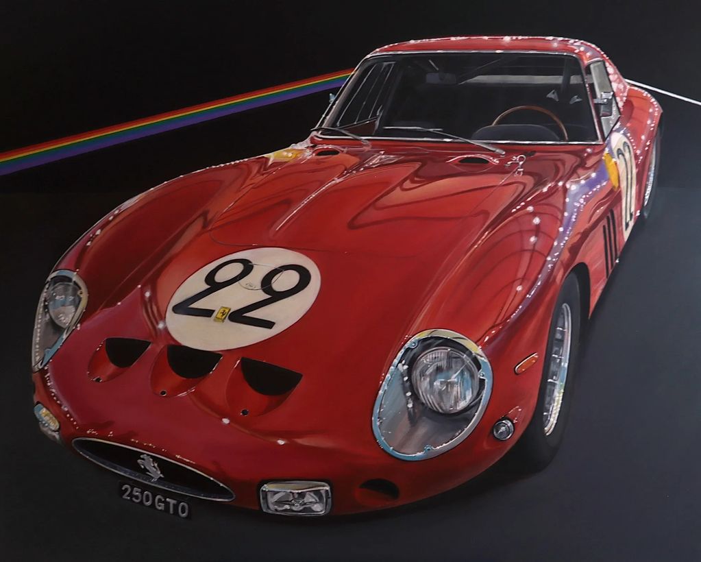 Classic red Ferrari 250 GTO race car with number 22 on a black background.