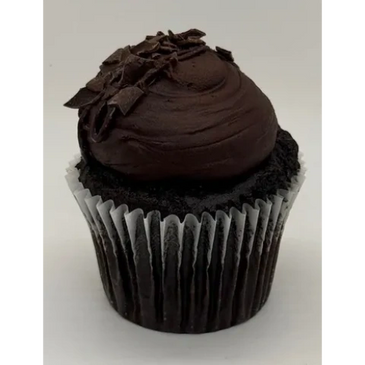 Rich chocolate cupcake with dark frosting and chocolate shavings.