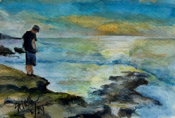 sunset on the ocean at La Jolla California with man 
