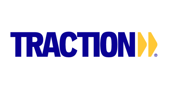 Logo of Traction, featuring bold blue text and yellow double arrows.