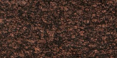 Close-up of a textured brown and black cork surface.