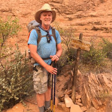 Todd Newport hiking through Red Bud Pass on way to Rainbow Bridge