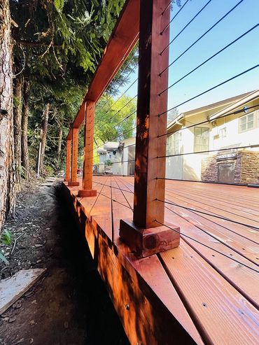 dark brown deck with railing