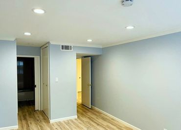 new ceiling with installed lights, blue wall