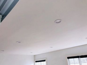 white ceiling with round small lights